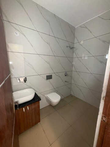 Bathroom in 3 BHK Builder Floor at Sahastradhara Road – for Sale