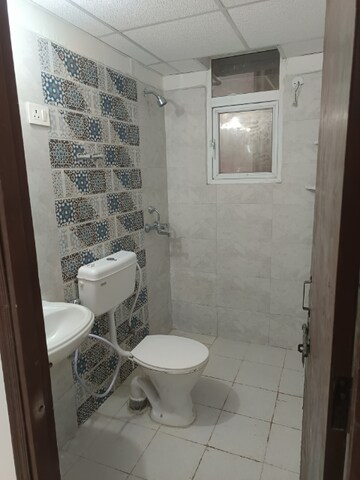 Bathroom in 2 BHK Apartment at Signature Global Proxima, Sector 89 – for Rent