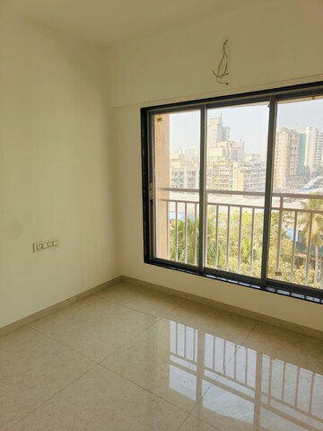 Room in 2 BHK Apartment at Rajasthan CHS, Andheri East – for Sale