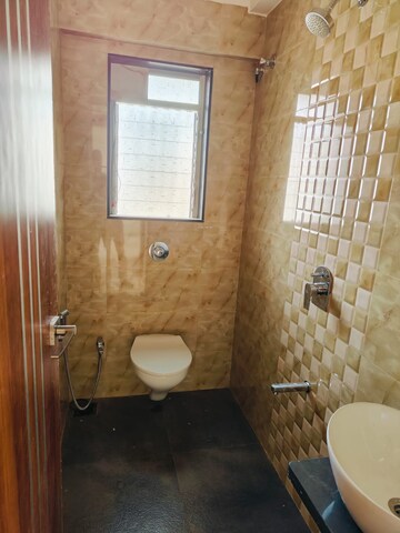 Bathroom in 2 BHK Apartment at Rajasthan CHS, Andheri East – for Sale