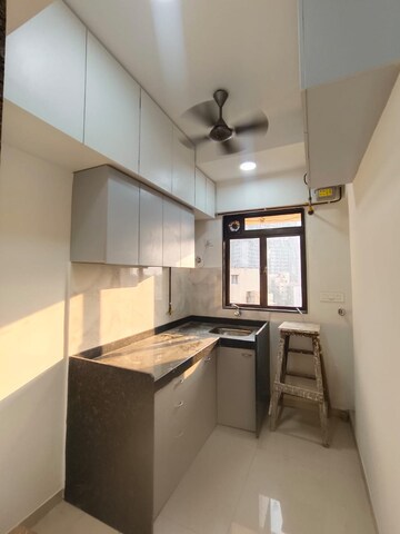 Kitchen in 2 BHK Apartment at Lotus Unity, Versova – for Rent