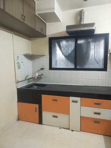 Kitchen in 2 BHK Apartment at Naiknavare Gardenia Society Phase 1, Wadgaon Sheri – for Rent