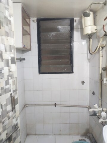 Kitchen in 2 BHK Apartment at Naiknavare Gardenia Society Phase 1, Wadgaon Sheri – for Rent
