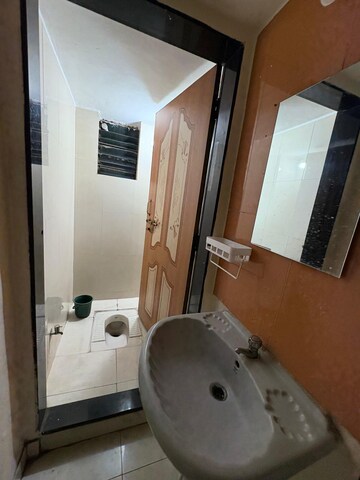 Bathroom in 2 BHK Apartment at Wadgaon Sheri – for Rent