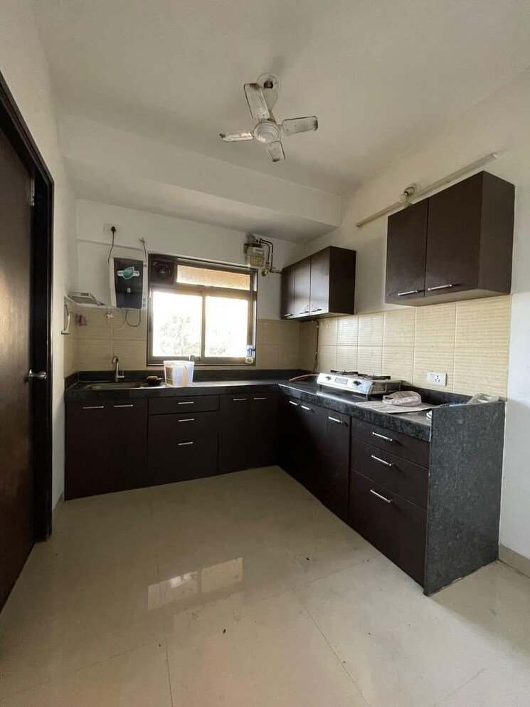 Kitchen, lodha-splendora-phase-ii 3 Bedroom 1164 Sq.Ft. Apartment In Ghodbunder Road Thane 8118304