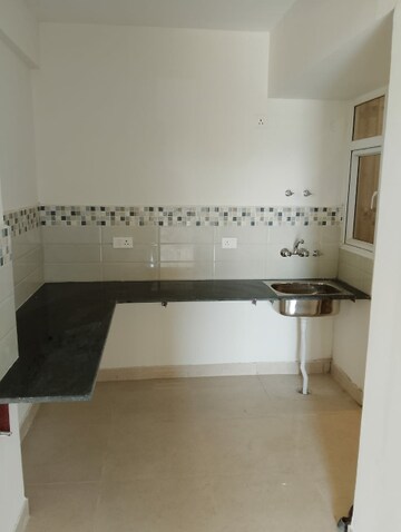 Kitchen in 2 BHK Apartment at Signature Orchard Avenue 2, Sector 93 – for Rent