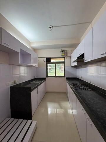Kitchen in 3 BHK Apartment at Lodha Splendora Tierra, Ghodbunder Road – for Sale