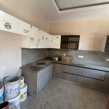 Kitchen in 4 BHK Builder Floor at Puri Aman Vilas, Sector 89 – for Sale