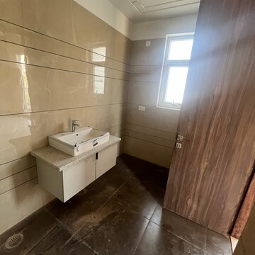 Bathroom in 4 BHK Builder Floor at Puri Aman Vilas, Sector 89 – for Sale
