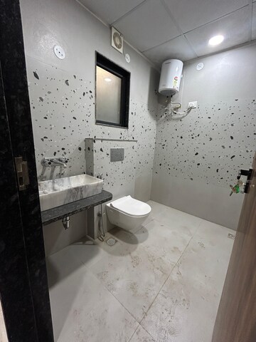 Bathroom in 4 BHK Apartment at Tilak Nagar – for Sale