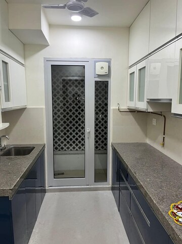 Kitchen in 2 BHK Apartment at Piramal Vaikunth, Balkum Pada – for Rent