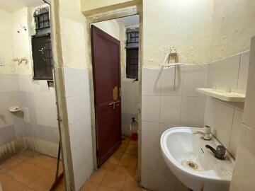 Bathroom in 1 BHK Apartment at Gokuldham LIG Apartments, Sector 135 – for Rent