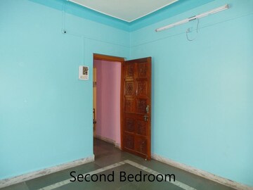 Bedroom in 2 BHK Apartment at Yashonandan Apartments, Rambaug Colony – for Rent
