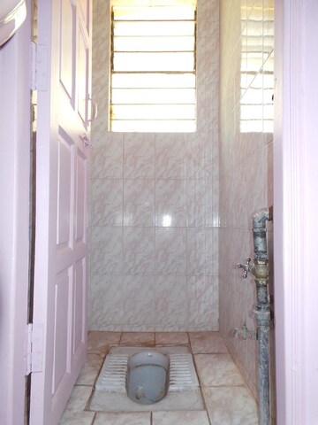 Bathroom in 2 BHK Apartment at Yashonandan Apartments, Rambaug Colony – for Rent