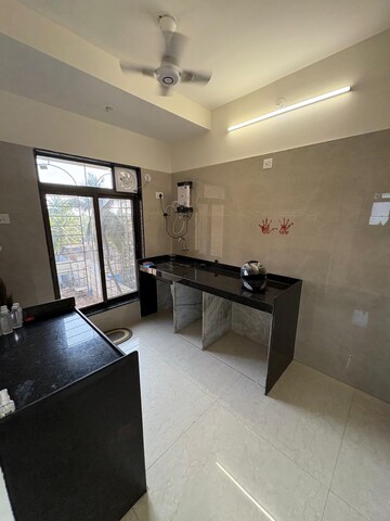 Kitchen in 2 BHK Apartment at Adityaraj Breeze, Vikhroli East – for Rent