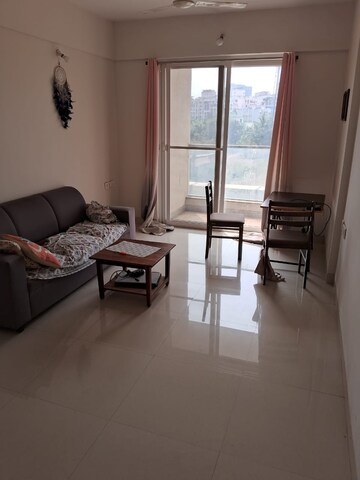 Living Room in 1 BHK Apartment at Ajax Global Lifestyle, Kharadi – for Rent