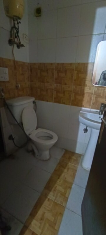 Bathroom in 2 BHK Apartment at Supertech Livingston, Sain Vihar – for Rent