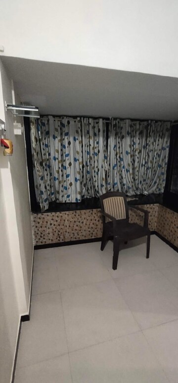 Living Room in 1 BHK Apartment at Dayanand CHS, Aarey Colony – for Rent