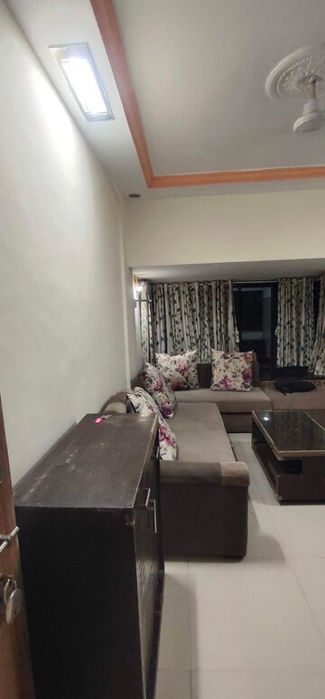 Living Room in 1 BHK Apartment at Dayanand CHS, Aarey Colony – for Rent