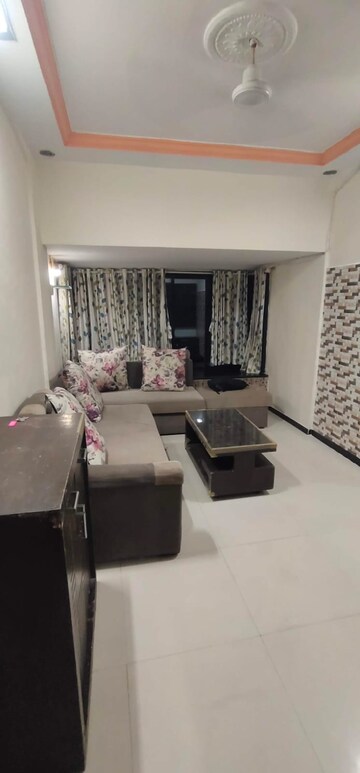 Living Room in 1 BHK Apartment at Dayanand CHS, Aarey Colony – for Rent