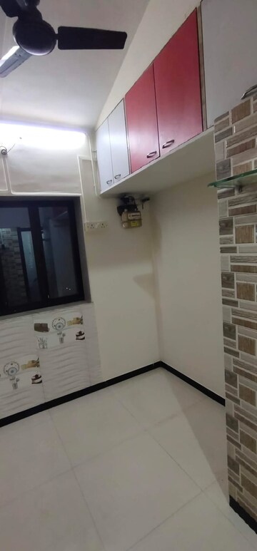 Kitchen in 1 BHK Apartment at Dayanand CHS, Aarey Colony – for Rent