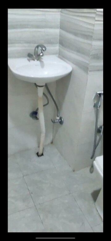 Bathroom in 1 RK Apartment at Emaar Palm Hills, Sector 77 – for Sale
