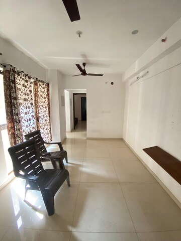 Living Room in 1 BHK Apartment at Lodha Palava Downtown, Dombivli East – for Rent
