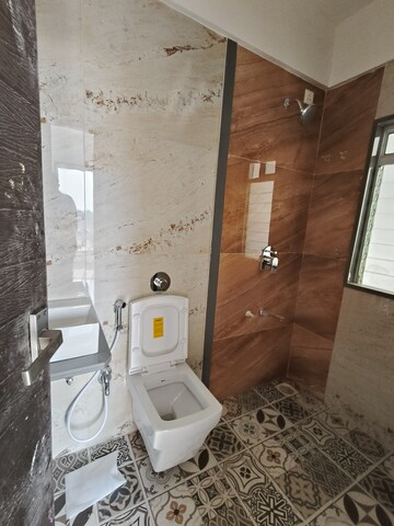 Bathroom in 1 BHK Apartment at Triveni Dynamic Ultima Bliss, Kalyan West – for Rent