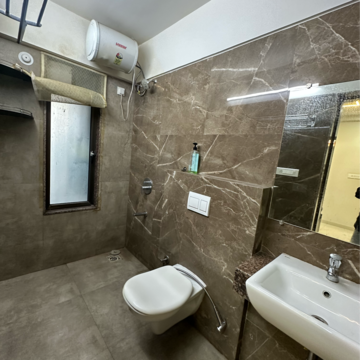 Bathroom in 3 BHK Apartment at MICL Aaradhya Nine, Naidu Colony – for Rent
