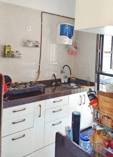Kitchen in 1 BHK Apartment at Durvas CHS, Nalasopara East – for Sale