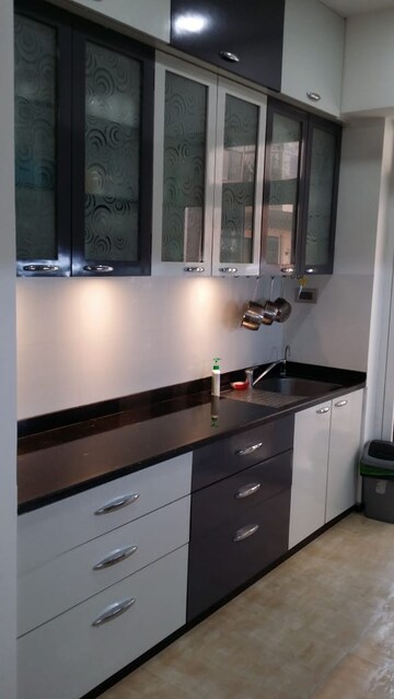 Kitchen in 2 BHK Apartment at Omkar Alta Monte, Malad East – for Rent