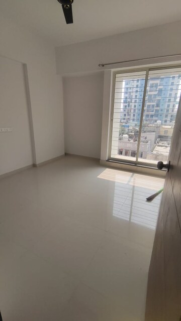 Bedroom in 2 BHK Apartment at Shivam 19 Grand West, Thergaon – for Rent