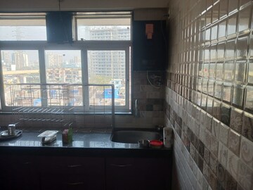 Kitchen in 2 BHK Apartment at Ayodhya Saffron Residency, Kurla – for Rent