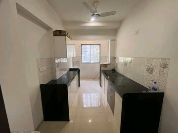 Kitchen in 2 BHK Apartment at Rajesh Raj Infinia, Malad West – for Rent