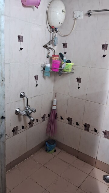 Bathroom in 2 BHK Apartment at Sun Damodar Shanti CHS, Sector 20 Kharghar – for Rent