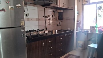 Kitchen in 2 BHK Apartment at Sun Damodar Shanti CHS, Sector 20 Kharghar – for Rent