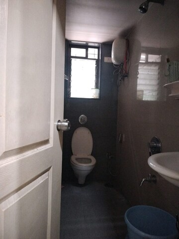 Bathroom in 2 BHK Apartment at Swastik Windsor Heights, Kharghar – for Rent