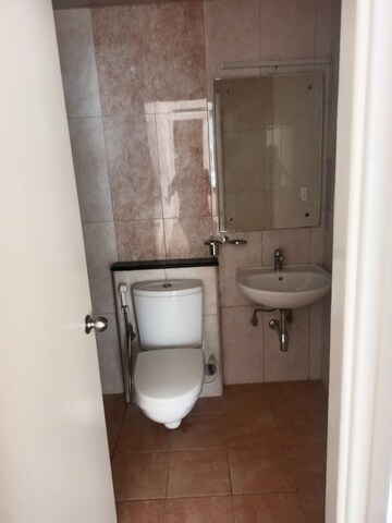 Bathroom in 2.5 BHK Apartment at Mantri Lithos, Thanisandra – for Rent