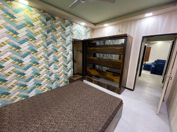 Bedroom in 2 BHK Apartment at Adarsh CHS Oshiwara, Oshiwara – for Rent