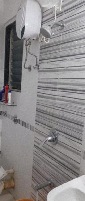 Bathroom in 2 BHK Apartment at Mahavir Kalpavruksha, Ghodbunder Road – for Sale