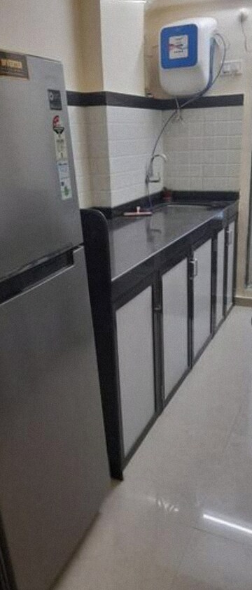 Kitchen in 2 BHK Apartment at Mahavir Kalpavruksha, Ghodbunder Road – for Sale