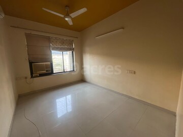Room in 2 BHK Apartment at Vasant Marvel Crown CHS, Kandivali East – for Sale