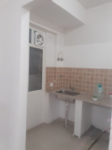 Kitchen in 2 BHK Apartment at Mahagun Mywoods, Sector 16c Greater Noida – for Rent