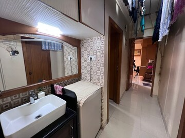 Kitchen in 3 BHK Apartment at Vasant Smruti Apartment, Kandivali East – for Rent