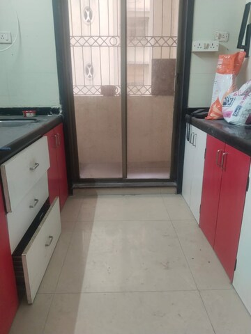 Kitchen in 2 BHK Apartment at Ravechi Heights, Kharghar – for Rent
