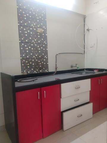 Kitchen in 2 BHK Apartment at Ravechi Heights, Kharghar – for Rent