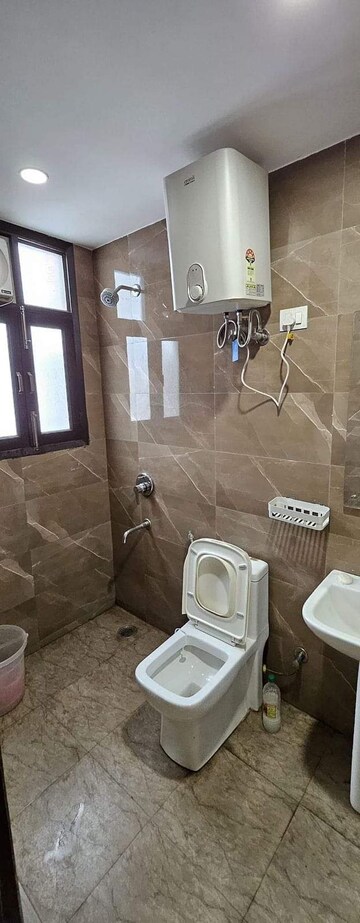 Bathroom in 1 BHK Builder Floor at Freedom Fighters Enclave – for Rent