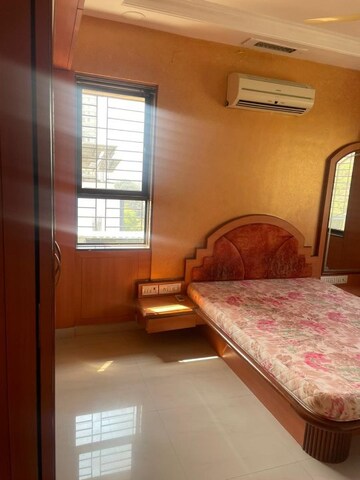 Bedroom in 2 BHK Apartment at Nilgiri Upvan CHS, Gawand Baug – for Rent