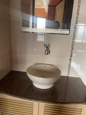 Bathroom in 2 BHK Apartment at Nilgiri Upvan CHS, Gawand Baug – for Rent