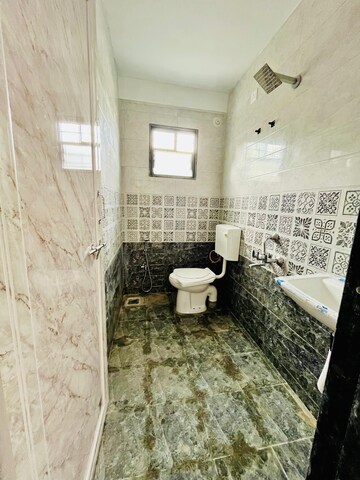 Bathroom in 1 BHK Apartment at Wadgaon Sheri – for Rent